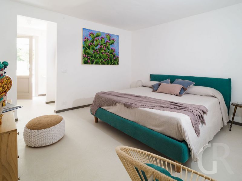 villa-pietra-del-sole-gruenes-doppelbett.jpg