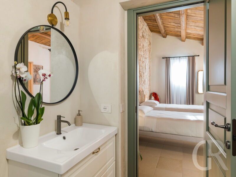 casa-ninetta-schlafzimmer-und-bad.jpg