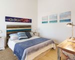 ferienhaus-marinella-grosses-doppelbett.jpg
