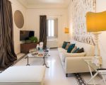 ferienwohnung-dimora-wohnraum-mit-sofa.jpg