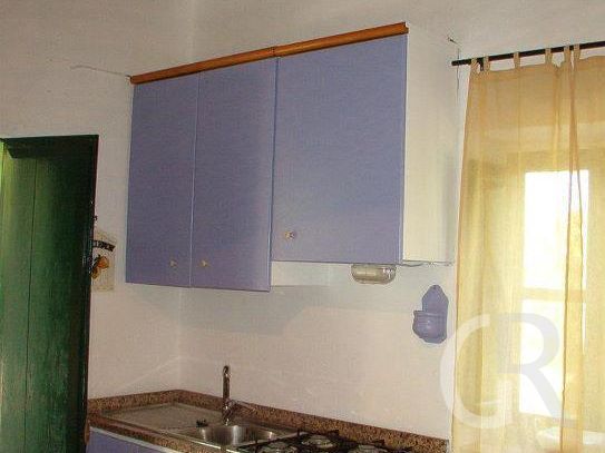 ferienhaus-gelso-kueche-mit-kleinem-esstisch.jpg