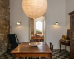 ferienhaus-tamerici-wohnraum-mit-tisch.jpg