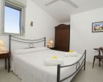 ferienwohnung-marinella-schlafzimmer.JPG