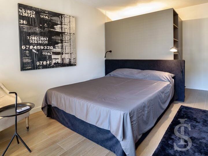 ferienwohnung-platone-doppelbett-im-schlafraum.jpg