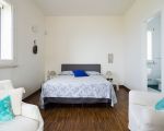 villa-ala-doppelbett-im-schlafzimmer.jpg