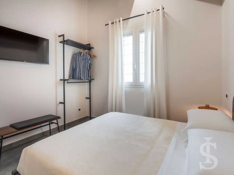villa-dimora-bufalefi-weiteres-schlafzimmer-mit-doppelbett.jpg