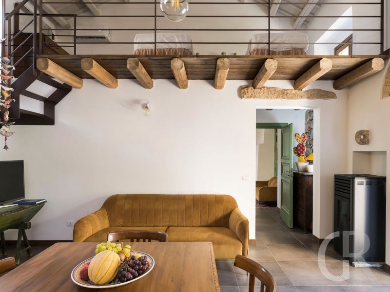 casa-don-carlo-esstisch-mit-sofa.jpg