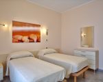 ferienwohnung-arance-schlafzimmer-mit-zwei-einzelbetten.jpg