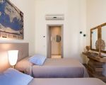ferienwohnung-dimora-blick-auf-das-doppelbett.jpg
