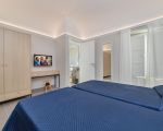 ferienwohnung-enea-schlafzimmer-mit-doppelbett.jpg