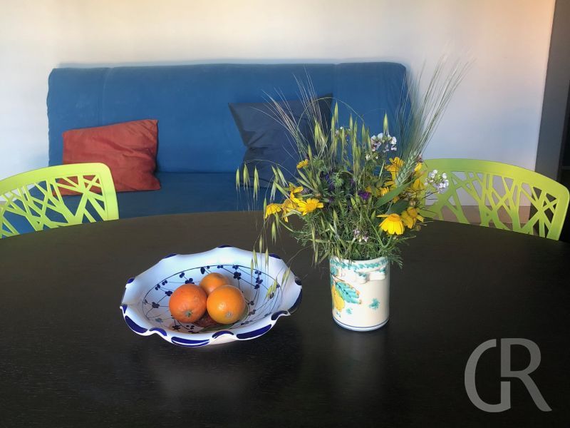 ferienwohnung-piscina-wohnbereich-mit-essplatz.jpg