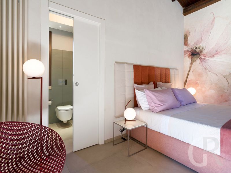 villa-corte-moscata-schlafbereich-mit-bett.jpg