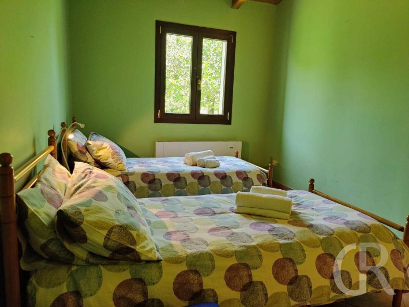 casa-limoni-schlafzimmer-mit-betten.jpg