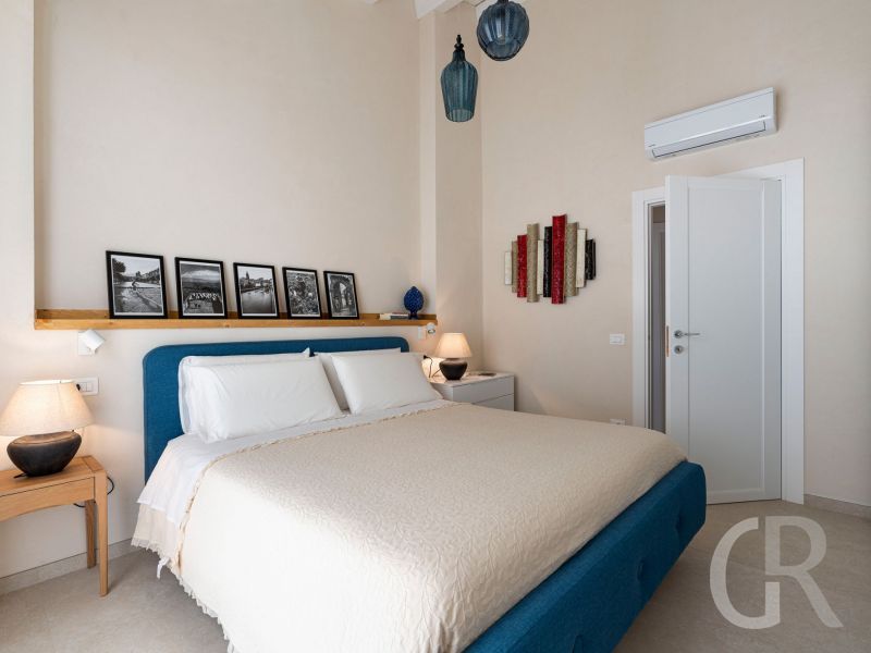 ferienhaus-villa-mora-bett-im-schlafzimmer.jpg