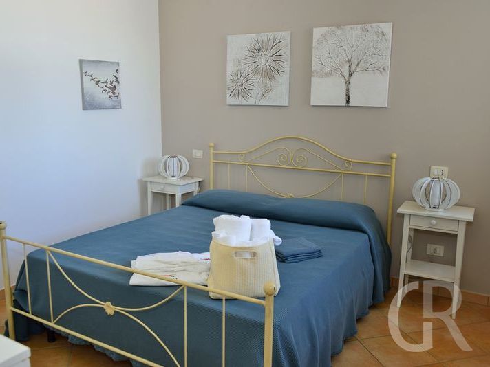 ferienwohnung-calantha-doppelbett.jpg