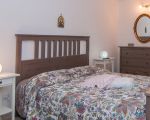 ferienwohnung-corrado-schlafbereich-mit-grossem-bett.jpg