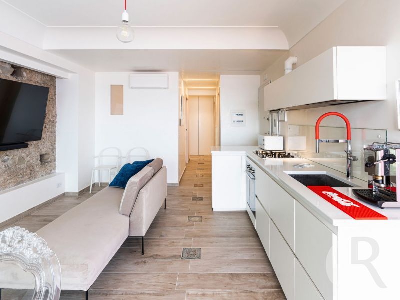 ferienwohnung-peppina-piccola-offener-wohnraum-mit-kueche.jpg