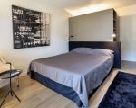 ferienwohnung-platone-doppelbett-im-schlafraum.jpg