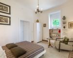 villa-la-forma-schlafzimmer-mit-sessel.jpg
