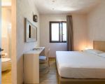 villa-magnolia-kleines-schlafzimmer.jpg