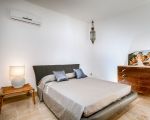 villa-profumo-schlafzimmer-mit-doppelbett.jpg