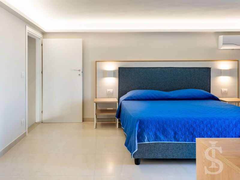 ferienhaus-mare-del-sud-gemuetliches-bett.jpg