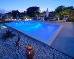ferienhaus-teti-am-abend-schwimmbad.jpg