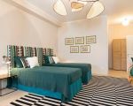 ferienwohnung-aurispa-zwei-betten-im-schlafzimmer.jpg