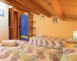 ferienwohnung-gioacchino-schlafzimmer-mit-doppelbett.jpg
