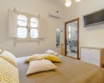villa-amelia-schlafzimmer-mit-bett.jpg