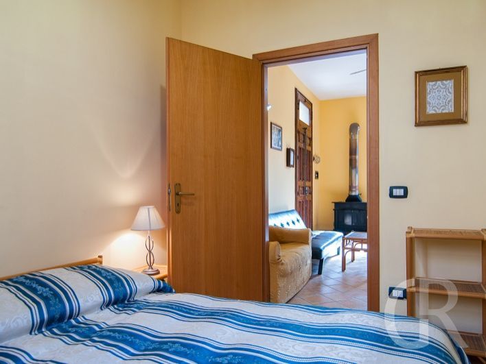 casa-capperi-schlafzimmer-mit-doppelbett.jpg