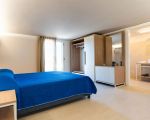 ferienhaus-mare-del-sud-grosszuegiges-schlafzimmer.jpg