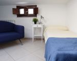 ferienwohnung-antonio-sofa-im-schlafzimmer.JPG