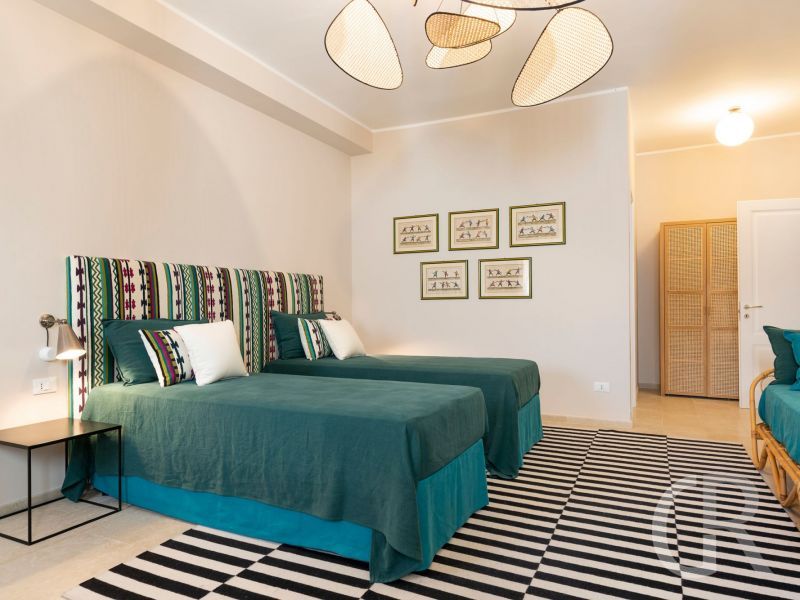 ferienwohnung-aurispa-zwei-betten-im-schlafzimmer.jpg