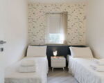 villa-blumarine-zwei-einzelbetten-im-schlafbereich.jpg