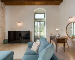 casa-ninetta-gruenes-sofa-im-wohnbereich.jpg
