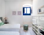 ferienhaus-baia-mar-schlafbereich-mit-bett.jpg