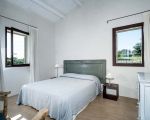 ferienhaus-carrubi-schlafbereich-mit-doppelbett.jpg