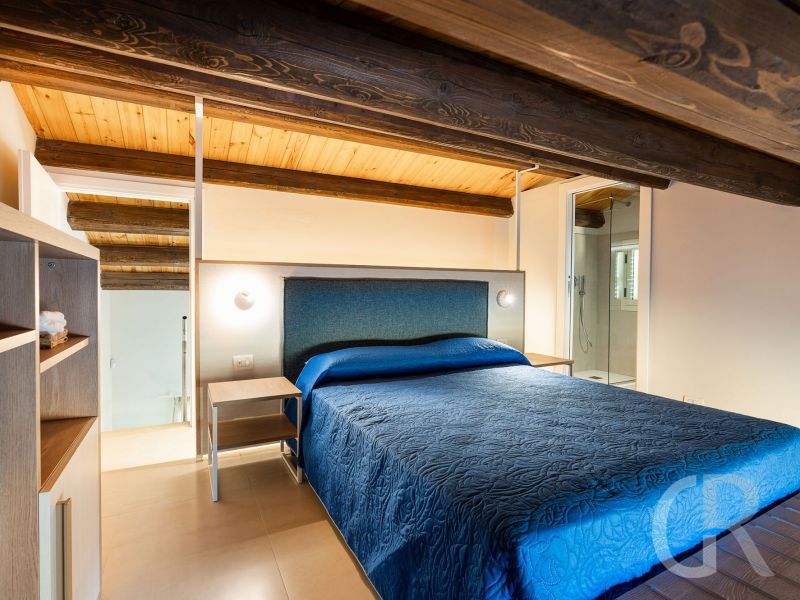 ferienhaus-mare-del-sud-schlafbereich-unterm-dach.jpg
