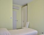 ferienwohnung-pistacchio-schlafzimmer-mit-zwei-einzelbetten.jpg