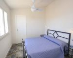 ferienwohnung-pitagora-schlafzimmer-mit-doppelbett.jpg