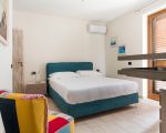villa-anthea-grosses-bett.jpg