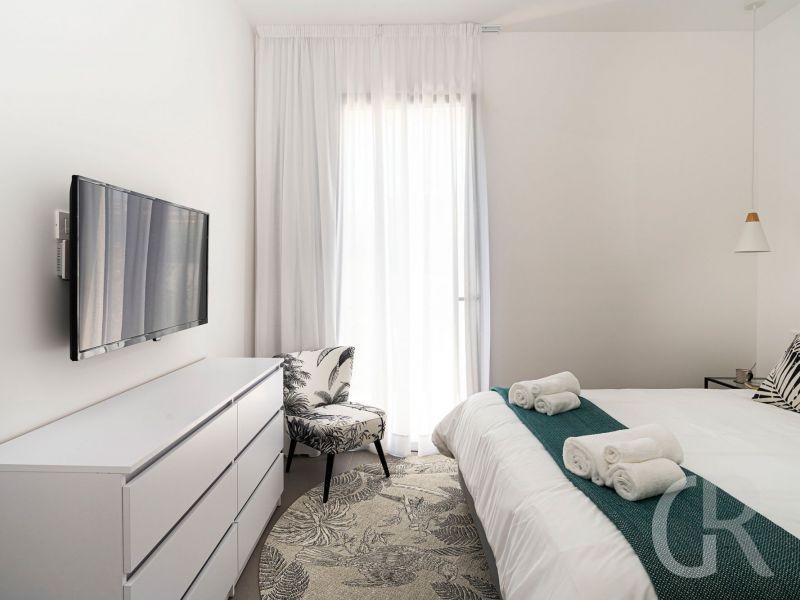 villa-bonita-schlafzimmer-mit-kommode-und-tv.jpg