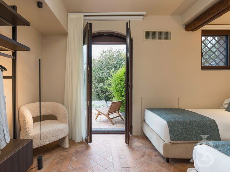 villa-continella-schlafzimmer-mit-zwei-einzelbetten-und-terrassenausgang.jpg