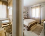 villa-gelsomina-badezimmer-und-schlafbereich.jpg
