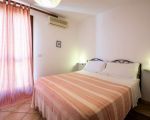 casa-grecale-schlafbereich-mit-doppelbett.jpg