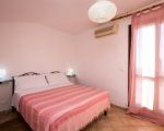 casa-scirocco-schlafbereich-mit-grossem-bett.jpg