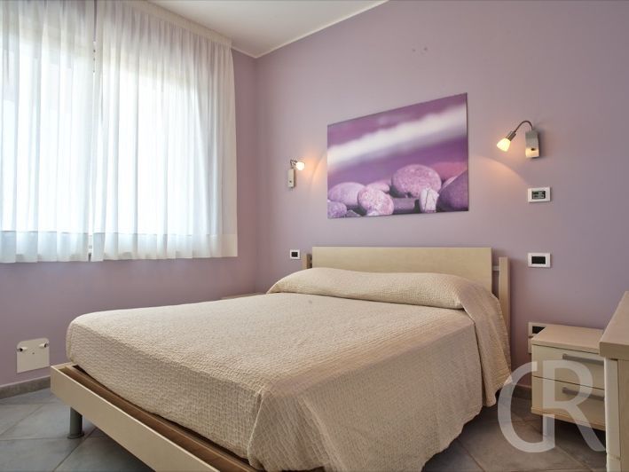 ferienwohnung-glicine-schlafzimmer-mit-dppelbett.jpg