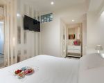 ferienwohnung-peppina-piccola-schlafzimmer-mit-tv.jpg