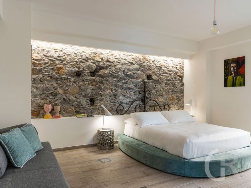 ferienwohnung-peppina-schlafzimmer-mit-bett.jpg